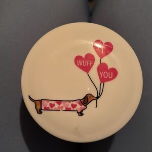 Sand + Paws Tropical Citrus Candle with dachshund lid.